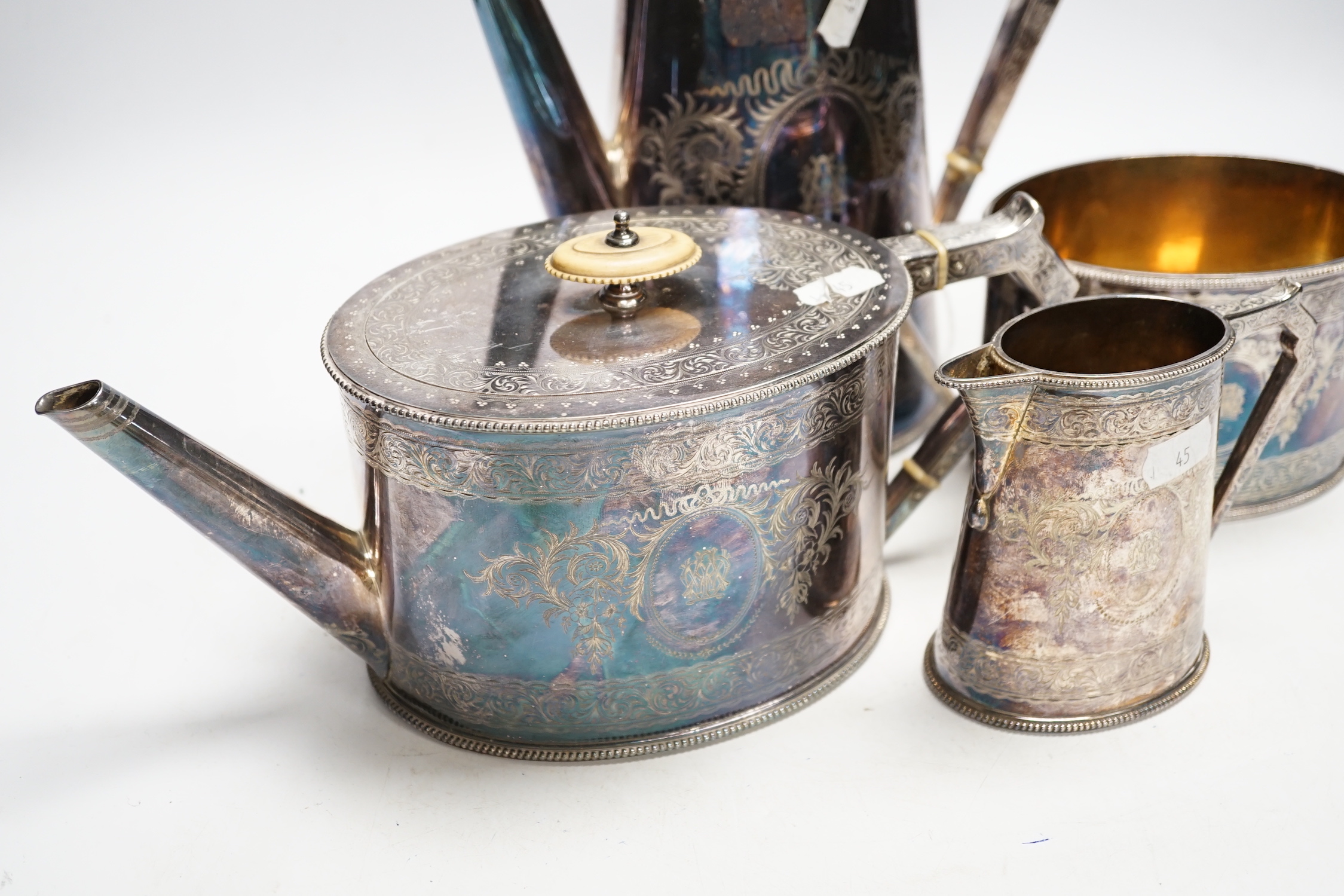 A late Victorian Elkington & Co silver plated four piece oval tea and coffee service, Elkington date letter for 1882, coffee pot 23cm high CITES Submission reference YKVE6DDT